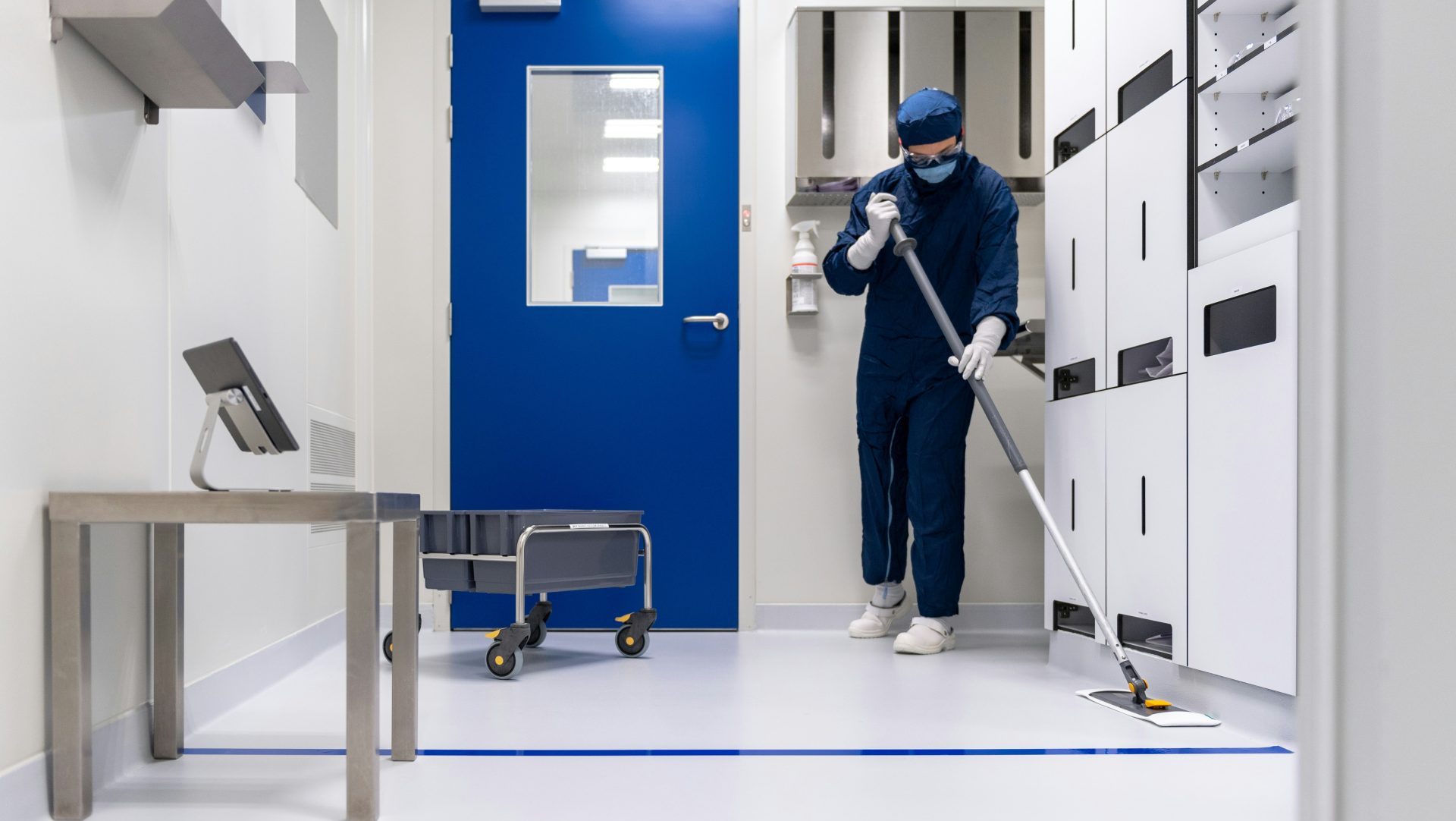 a person in a blue mask and a mask holding a ladder